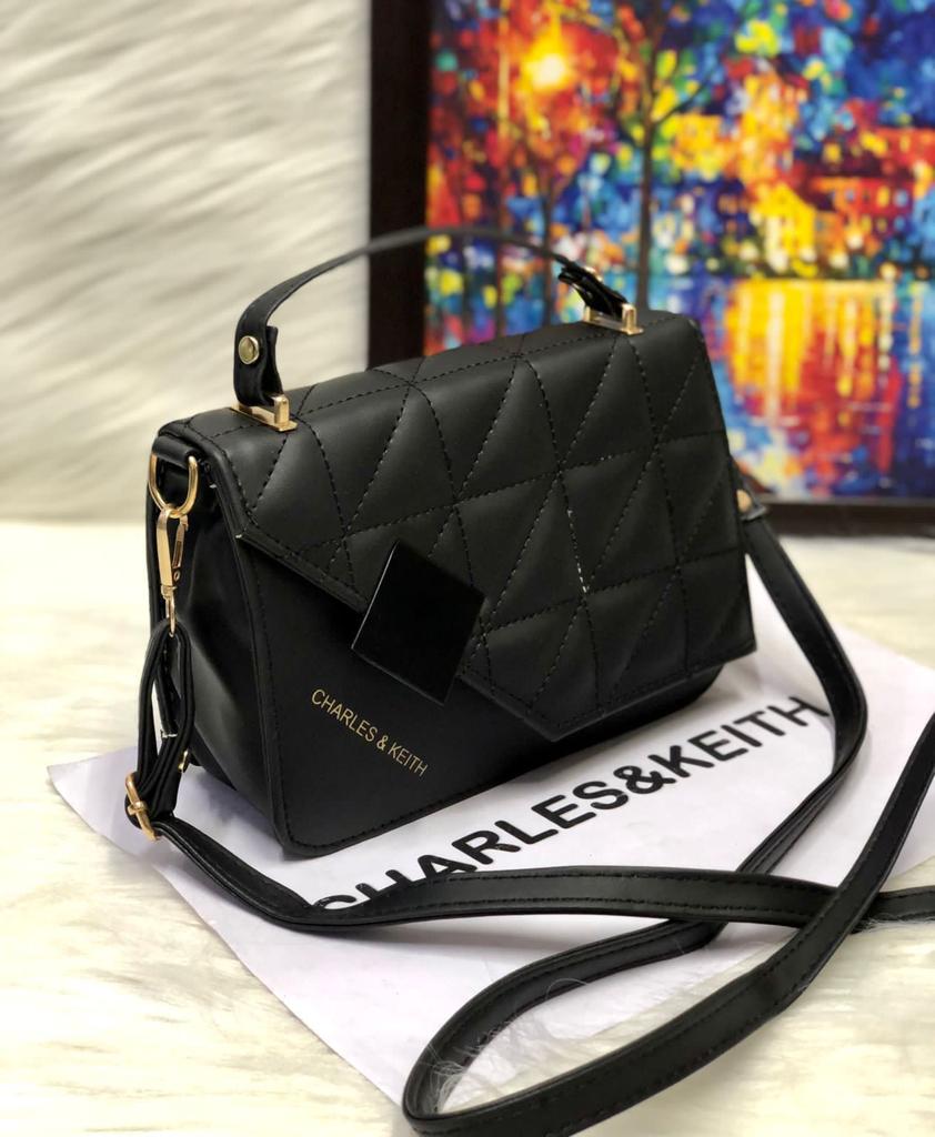 Chic Minimalism: Small Sling with Front Cut Design